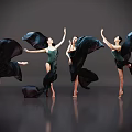 Women Dancing in Green Leotards with Flowing Black Fabric on Grey Background
