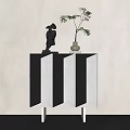 Modern Entryway Cabinet Sideboard with Black White Striped Design Metal Legs Decorative Figurine and Green Plant