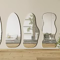 Irregular Shaped Wall Mirrors Reflecting Sofa Plants And Wooden Floor Interior
