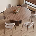 Modern Dining Room With Round Wooden Table Six Chairs Fruit Bowl And Vase
