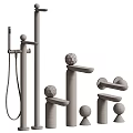 Elegant Modern Faucet Design With Spherical Handles Gold And Black Finishes