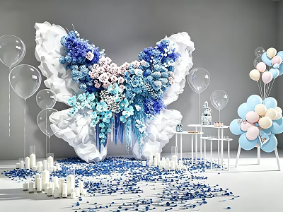 Butterfly Shaped Floral Installation With Blue And White Flowers Balloons Candles And Scattered Petals 3d model