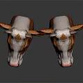 Two Brown And White Cow Head Models With Pink Noses And Big Ears