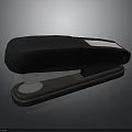 Black Office Stapler With White Accent And Round Base For Workspace And Daily Use