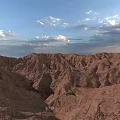Stunning Red Rock Canyon Landscape Under Blue Sky With White Clouds