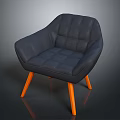 Modern Black Tufted Armchair With Orange Wooden Legs And Soft Cushion Design