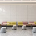 Hospital Outpatient Clinic Waiting Area with Gray Yellow Sofa Benches Round Tables Stools Bright Lighting