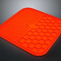 Vibrant Orange Silicone Kitchen Mat with Textured Surface and Honeycomb Pattern for Heat Resistance