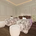 Elegant Spa Room Featuring Two Massage Tables Patterned Sheets White Stools and Decorative Lights