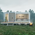 Modern Container Style Guesthouse Building Set In Misty Grassland With Trees Terrace And Outdoor Seating