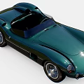Green Classic Open Top Sports Car With Streamlined Bodywork And Vintage Design