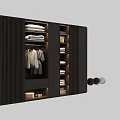 Modern Wooden Wardrobe Interior With Slatted Panels Hanging Garments Built in Lighting And Folded Clothes