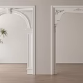 White Decorative Door Arches With Ornate Details Green Plant And Wooden Floor