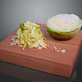Fresh Green Cabbage Halved with Shredded Pieces on Wooden Cutting Board