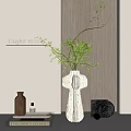 Modern Decorative Ornament Set With Vase Green Foliage Bottle Book Black Sphere On White Tabletop