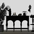 Elegant Black Console Table With Indoor Plant Vintage Telephone Sculpture And Flower Vase In Sunlight
