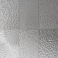 Silver Textured Wall Decor With Multiple Patterned Panels For Modern Interiors