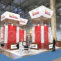 Orthoworks Exhibition Booth Featuring Red Structure White Canopy Multiple Columns And Visitors
