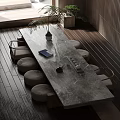 Modern Tea Table and Chairs with Marble Top Cushioned Stools and Potted Plant
