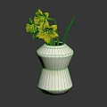 Yellow Daffodils With Green Leaves Arranged In White Modern Vase Decoration