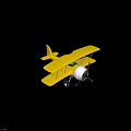 Vintage Yellow Biplane Model With Open Cockpit Propeller And Blue Background