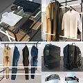 Retail Clothing Display Featuring Mannequin Coat Shirt and Pants on Hanging Racks