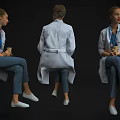 Woman In White Coat And Blue Scrubs With Stethoscope Sitting Holding Cup