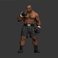 Shirtless Muscular Man in Boxing Stance Wearing Black Shorts and Gloves