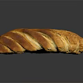 Freshly Baked Golden Brown Braided Bread With Shiny Surface On Dark Background