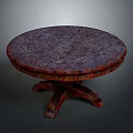 Round Wooden Table With Textured Top And Ornate Carved Legs Design