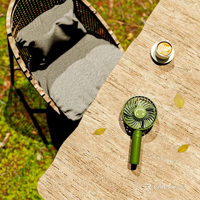 Outdoor Table with Wicker Chair Gray Cushion Small Green Fan and Coffee in Natural Setting 3d model 