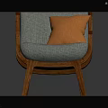 Light Blue Chair With Wooden Legs Armrests And Orange Pillow On Cushioned Seat