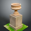 Decorative Stone Urn With Ornate Top On Square Pedestal In Green Grass
