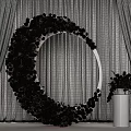 Round Floral Arch With Pink Yellow Flowers Gray Curtains And White Vase