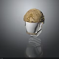 Sand Colored Military Helmet With Worn Texture And Chin Strap Design