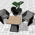 Two Woven Leisure Chairs With Square Wooden Table And Green Plants On Tile Floor