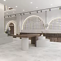 Elegant Modern Boutique Store Interior With Curved Sofa Round Coffee Table And Decorative Plants