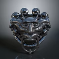 Dark Metallic Sculptural Mask With Spherical Decorations And Ring Detail