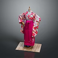 Woman in Traditional Pink Kimono With Floral Patterns And Purple Obi