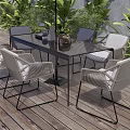 Outdoor Landscape Seating With Table Umbrella Green Plants On Wooden Floor