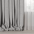 Gray Textured Curtains Draped With White Sheer For Window Interior Design