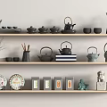 Elegant Tea Set Displayed On Wooden Shelves With Teapots Teacups And Decorative Items