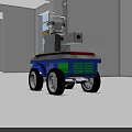 Small Robot With Camera Blue Base And Black Wheels In Indoor Setting With Window Light