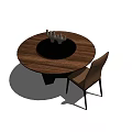 Round Wooden Dining Table With Black Center And Candle Holders Plus Matching Chair