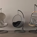 Three Stylish Modern Hanging Chairs Woven Metal Frame And Cushioned Comfortable Seats
