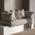 Neutral Toned Textured Throw Pillows On White Bench With Soft Blanket