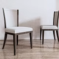 Modern Accent Chairs With Dark Wooden Frame And Light Fabric Seats On Wooden Floor