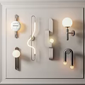 Modern Wall Lamps With Various Contemporary Designs Mounted On White Panel