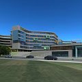 Modern School Campus Buildings With Track Field Lawn And Green Surroundings