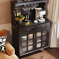 Black Sideboard With Glass Doors Displaying Sunflower Bouquet Coffee Maker And Spice Jars In Home
